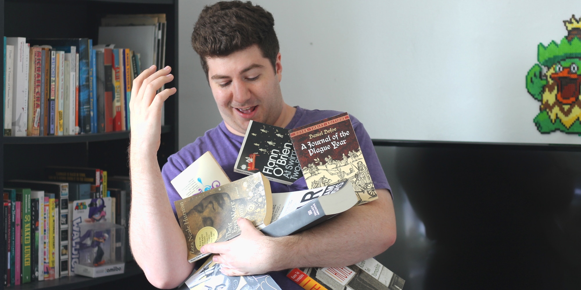 me struggling to hold all the books I'm not reading