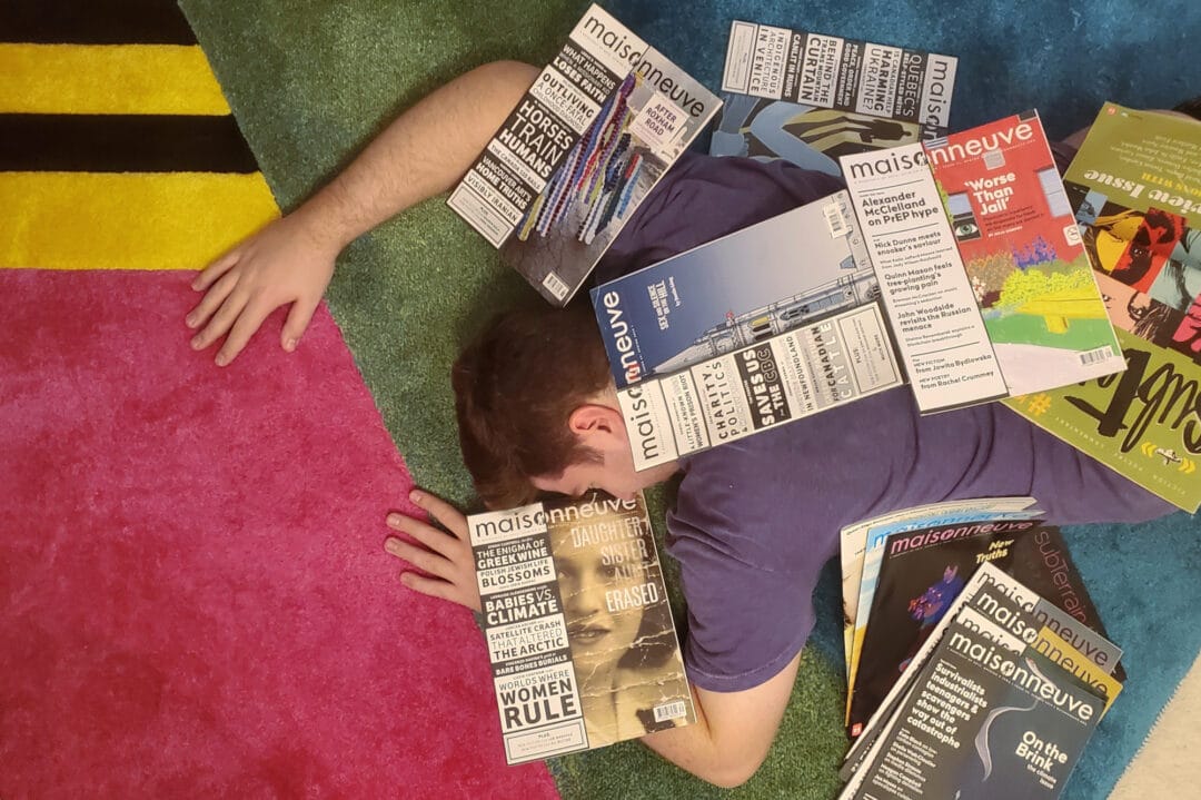 I lie on the floor covered in magazines